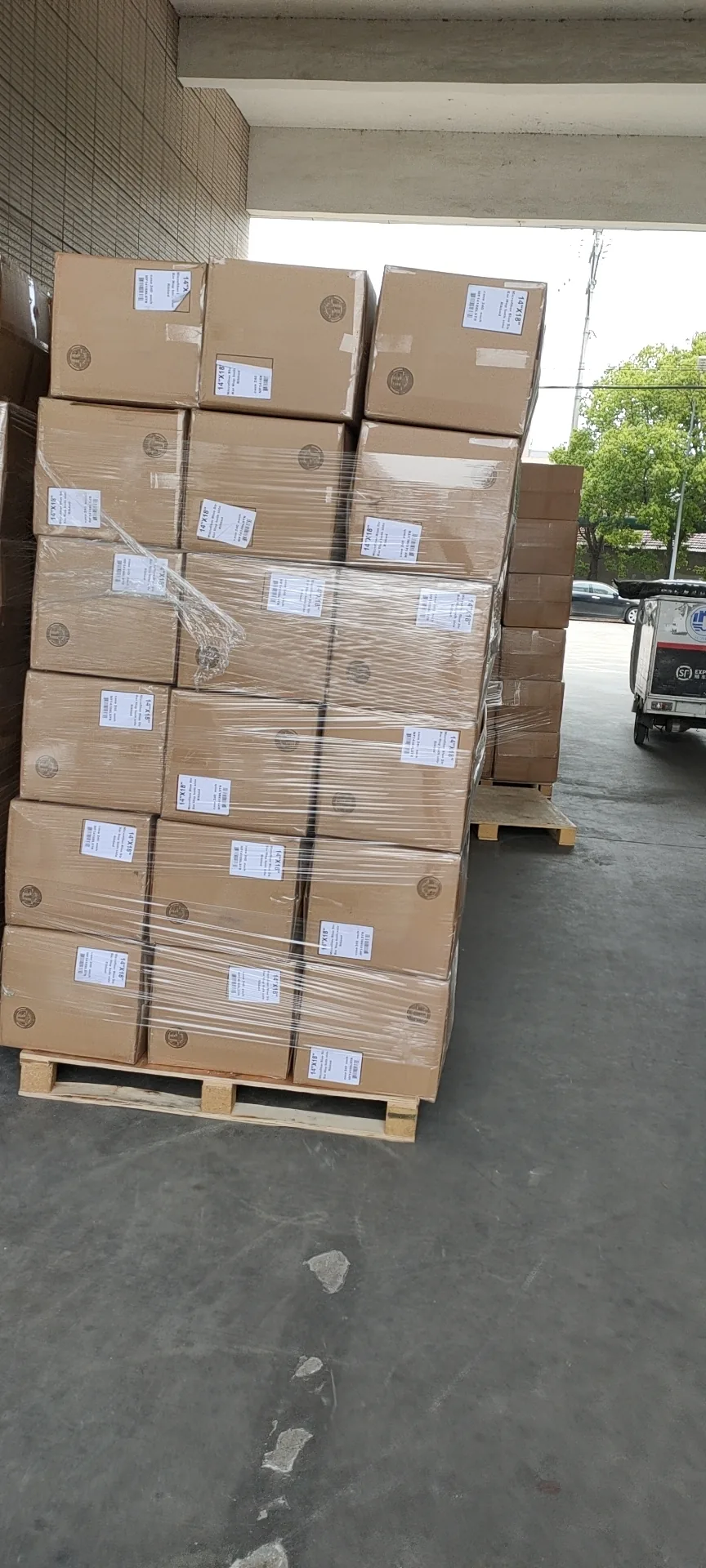 Commercial textile cartons palletized and staged for dispatch